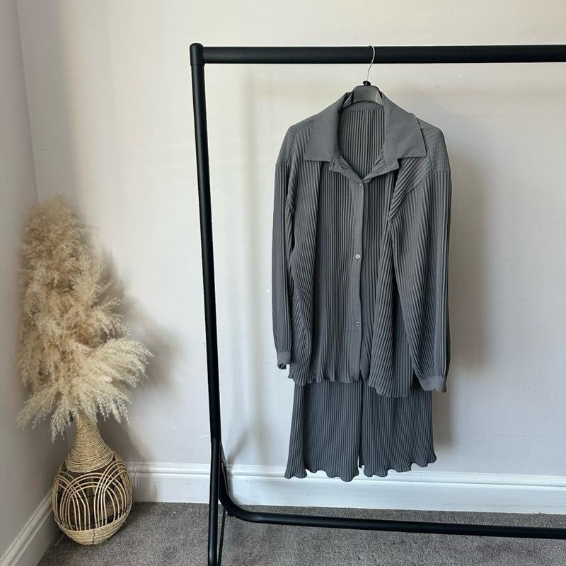 Pleated Buttoned Coord Set: Matching Top and Trousers for Comfortable Wear